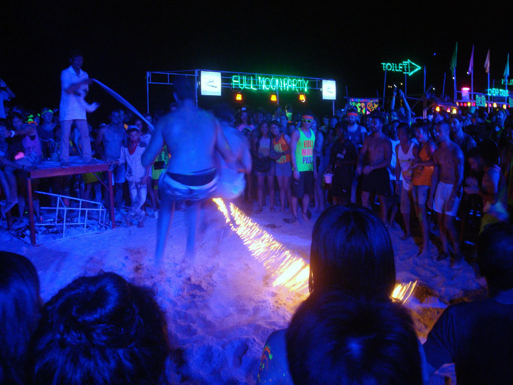 Fire rope jumping at Full Moon Party